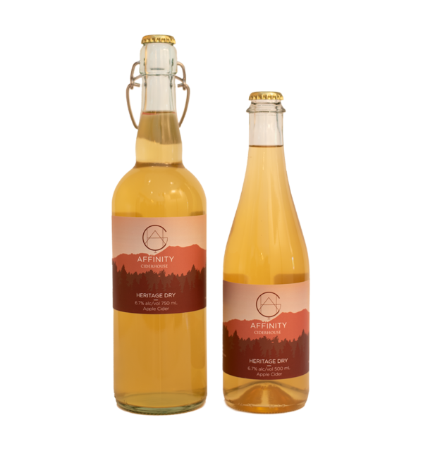 Bottles of Heritage Dry apple cider in both 750 and 500 ml sizes